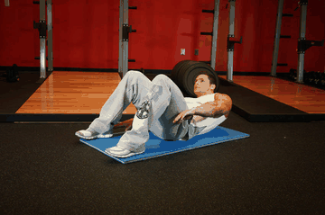 Alternate Heel Touchers exercise demonstration targeting Abdominals