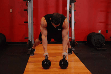 Alternating Renegade Row exercise demonstration targeting Middle Back
