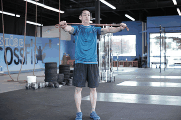 Band Pull-Apart exercise demonstration targeting Shoulders
