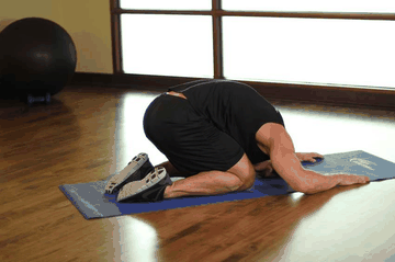 Child's Pose exercise demonstration targeting Lower Back