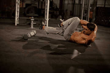 Elbow to Knee exercise demonstration targeting Abdominals