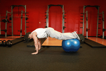 Exercise Ball Pike exercise demonstration targeting Abdominals