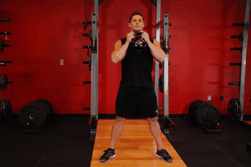 Kettlebell Front Squat exercise demonstration targeting Quadriceps
