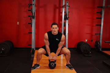 Kettlebell High Pull exercise demonstration targeting Traps