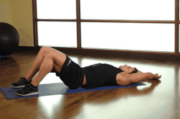 Pelvic Tilt Into Bridge exercise demonstration targeting Lower Back