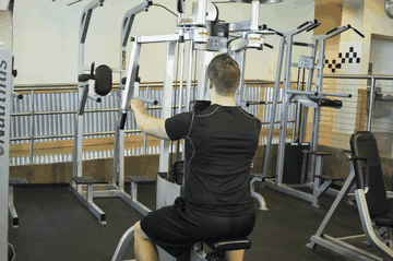 Reverse Machine Flyes exercise demonstration targeting Shoulders