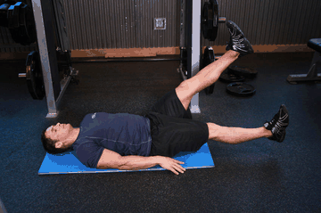 Scissor Kick exercise demonstration targeting Abdominals