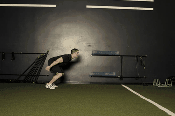 Standing Long Jump exercise demonstration targeting Quadriceps