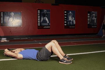 Supine Two-Arm Overhead Throw exercise demonstration targeting Abdominals