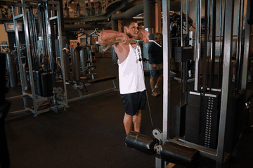 Upright Cable Row exercise demonstration targeting Traps
